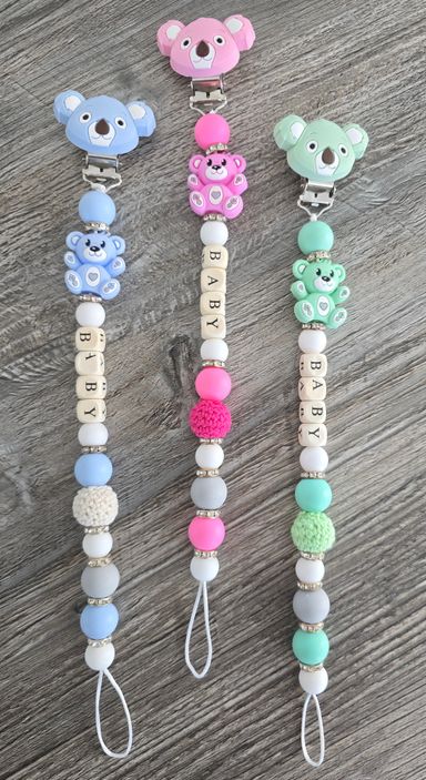 SchnullerkettemitNamenRosaHellblauSilikonHolzPinkMintgrünSchnulliketteEvent-Shop-Hameln